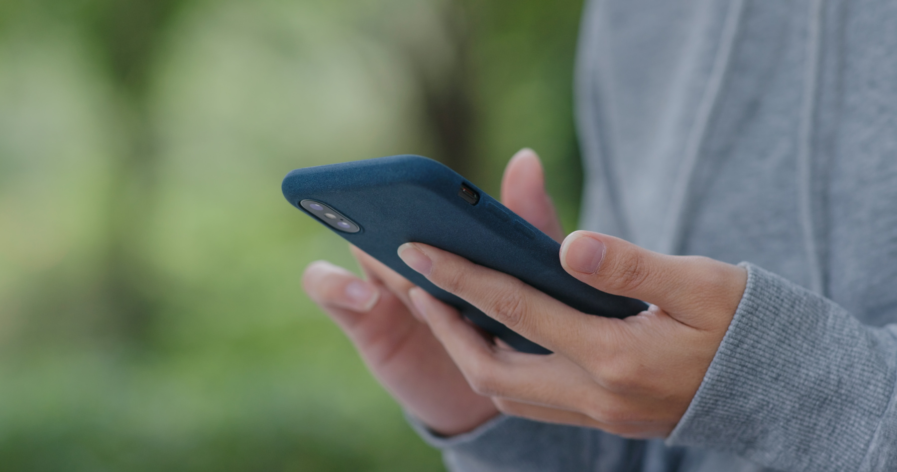 Woman Using Mobile Phone Online